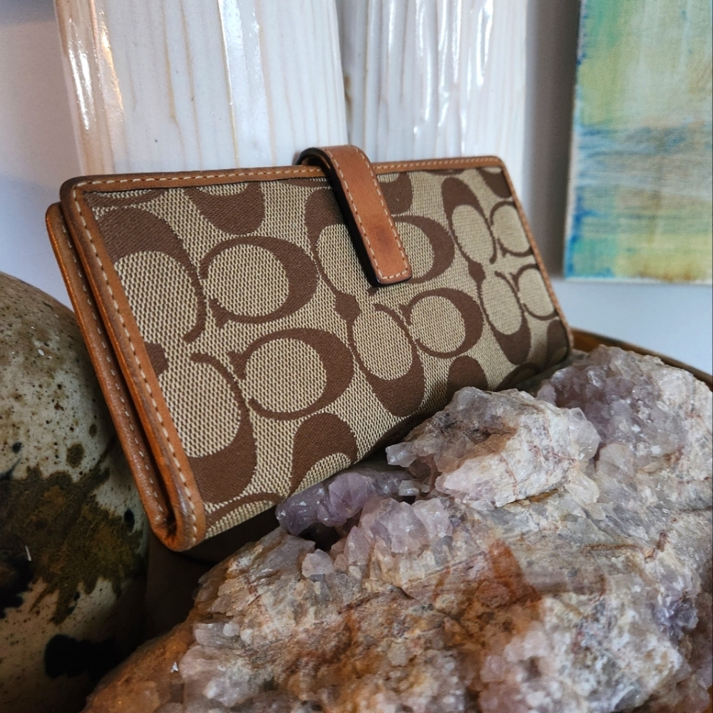 Classic COACH wallet with snap closure